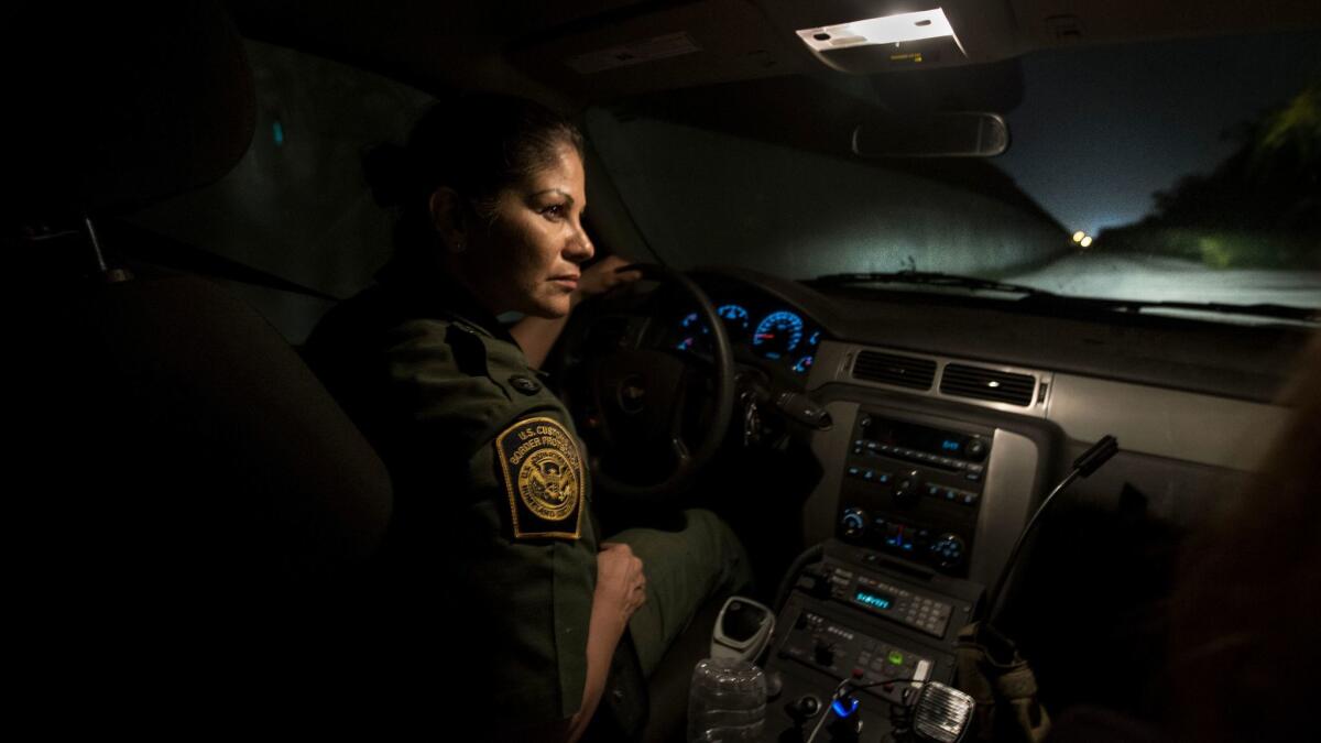 U.S. Border Patrol agent Marlene Castro keeps watch in Hidalgo, Texas, a once-bustling but now quiet crossing point.