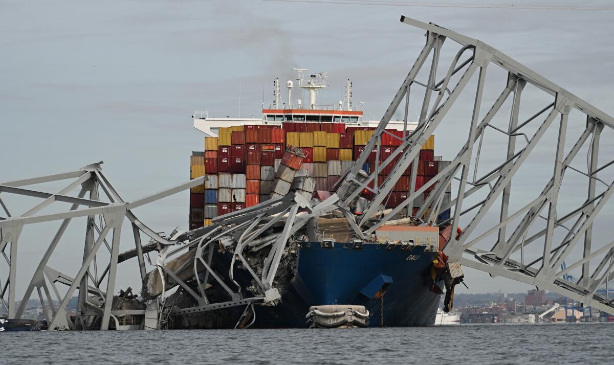 A cargo ship and a collapsed bridge 