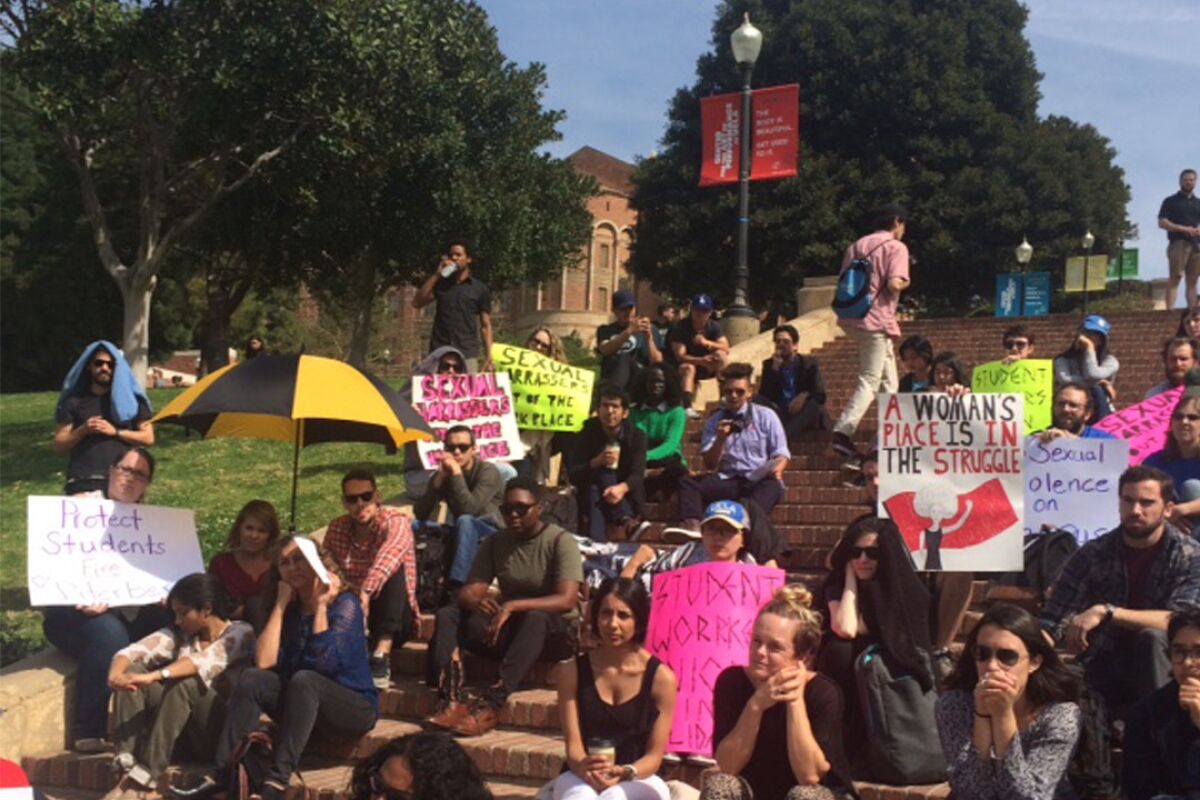 Students and other members of the UCLA community gather on the Westwood campus to protest the university's handling of sexual harassment complaints made against history professor Gabriel Piterberg.