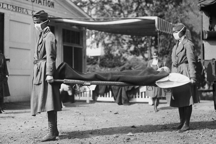 A demonstration at the Red Cross Emergency Ambulance Station in Washington during the influenza pandemic of 1918. 