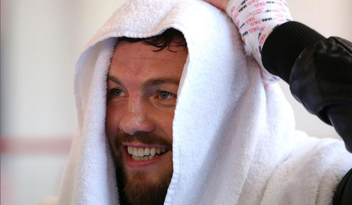 Andy Lee takes part in a media workout Dec. 15 at Arnie's Gym in Manchester, England.