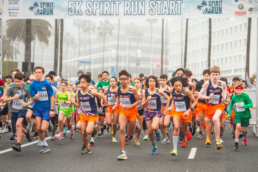 Kids book it across the starting line for the Youth 5K. The race is one of a number that are included as part of the Newport Mesa Spirit Run, which is returning on March 17 this year.