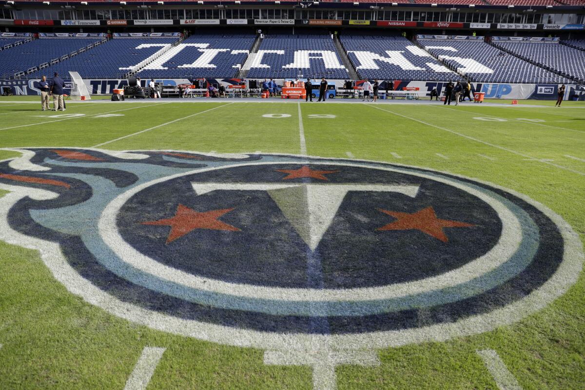 The Tennessee Titans logo on the field at Nissan Stadium in Nashville.