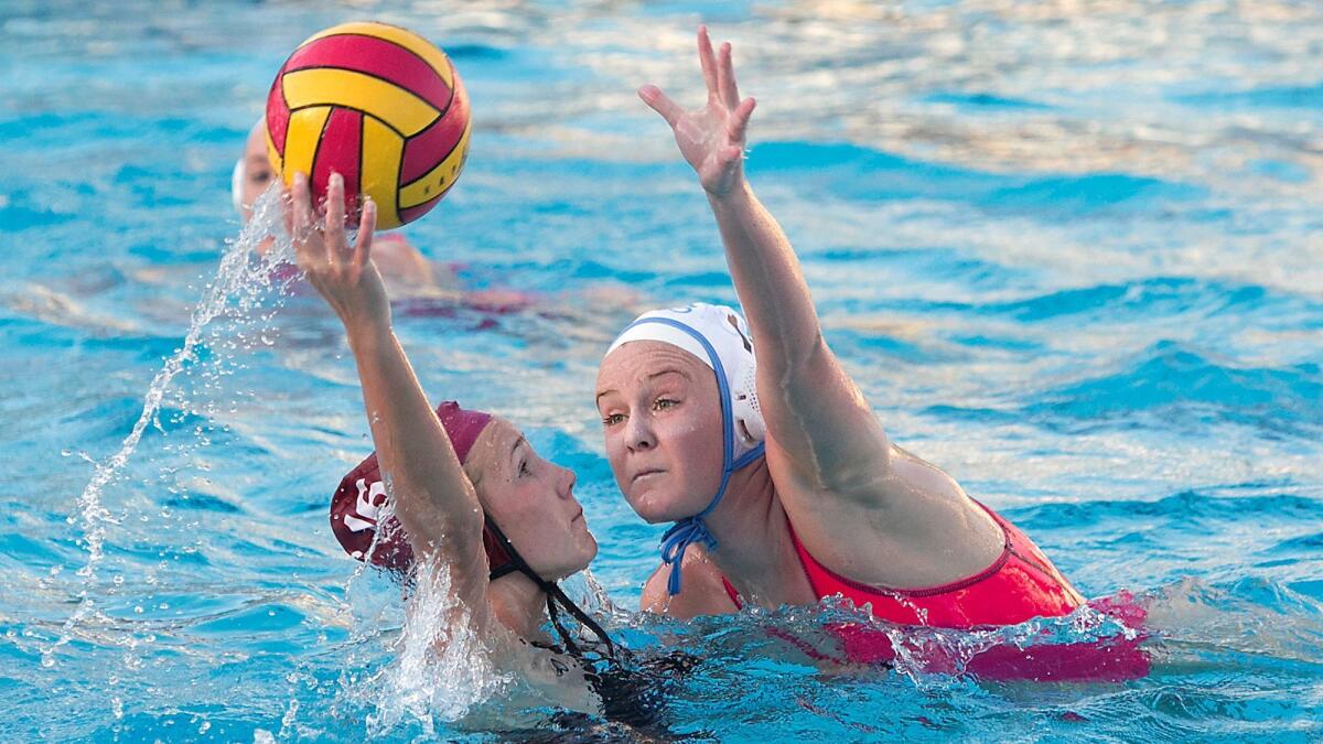 Laguna Beach freshman Nicole Struss, left, and Corona del Mar junior Sophie Wallace, shown in action on Jan. 17, 2018, are key players for the Breakers and Sea Kings, who will compete next weekend in the CIF Southern California Regional tournament.