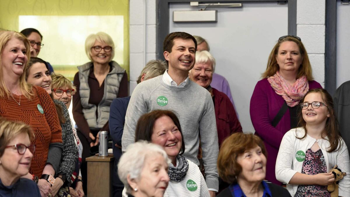 South Bend Mayor Pete Buttigieg waits to speak to a crowd about his presidential run at the Circle of Friends Community Center in Greenville, S.C. on March 23.