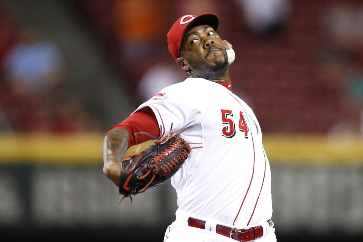 Reds closer Aroldis Chapman pitches in the ninth inning against the Tigers at Great American Ball Park on Aug. 24, 2015.