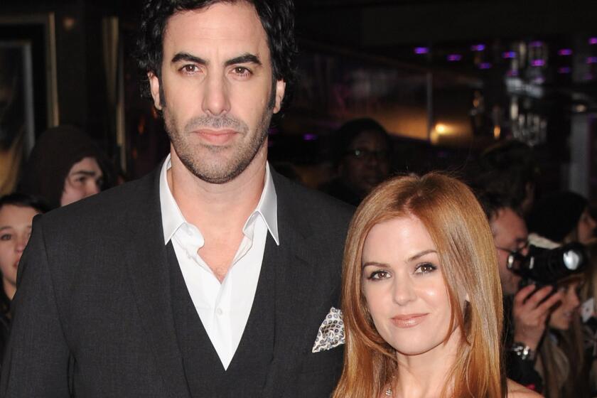 Sacha Baron Cohen and Isla Fisher attend the "Les Miserables" world premiere in London on Dec. 5, 2012.