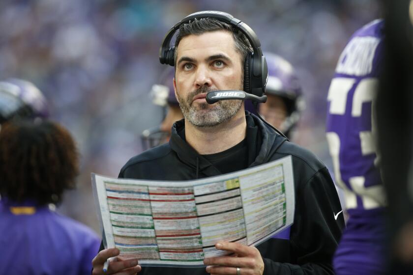 FILE - In this Dec. 16, 2018, file photo, Minnesota Vikings interim offensive coordinator Kevin Stefanski watches from the sideline during the first half of an NFL football game against the Miami Dolphins in Minneapolis. The Cleveland Browns are hiring Stefanski as their new coach, a person familiar with the decision told the Associated Press. Stefanski agreed to accept the position Sunday, Jan. 12, 2020, a day after Minnesota was beaten by San Francisco in the NFC playoffs, according to the person who spoke to the AP on condition of anonymity because the team has not announced the decision. (AP Photo/Bruce Kluckhohn, File)