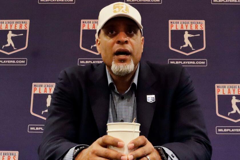 FIEL - In this Feb. 19, 2017, file photo, Tony Clark, executive director of the Major League Players Association, answers questions at a news conference in Phoenix. Clark sadi Tuesday, Feb. 6, 2018, that the number of rebuilding teams and unsigned free agents in a historically slow market ???threatens the very integrity of our game.??? Just 53 of 166 players who exercised their free agency rights last November had announced agreements entering Tuesday, down from 99 of 158 at a similar time last year. (AP Photo/Morry Gash, File)