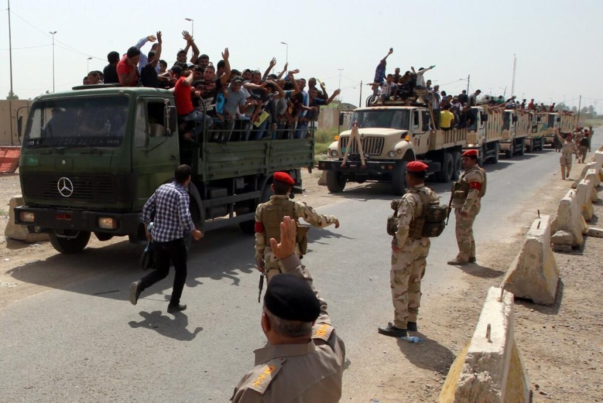 Iraqi men who volunteered to join the fight against a major offensive by jihadists in northern Iraq stand on army trucks as they leave a recruiting center in the capital Baghdad. The fighting here and in or near several other oil-rich parts of the world have sent crude prices soaring.