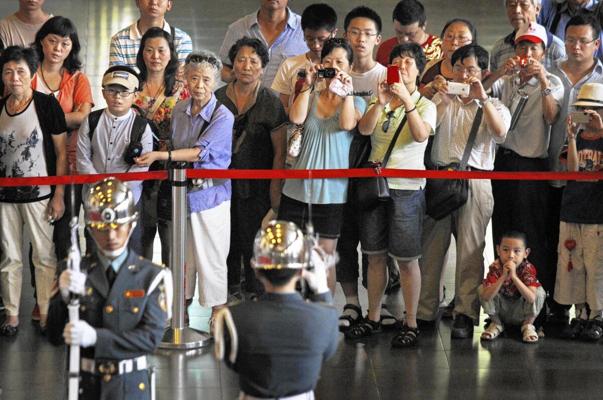 The changing of the guard at the Sun Yat-sen Memorial Hall in Taipei, the Taiwanese capital, is a popular event for tourists from China.
