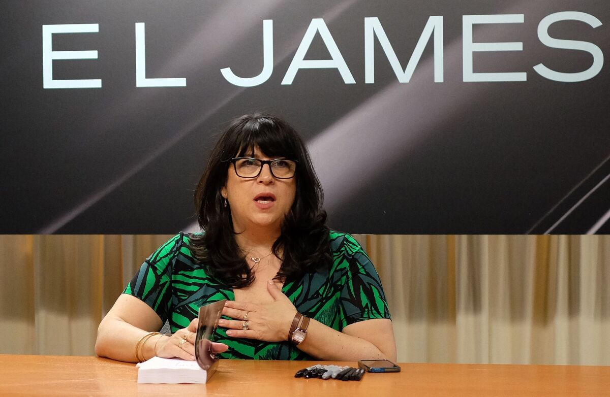 E.L. James' signs copies of "Grey: Fifty Shades of Grey as Told by Christian" in New York on June 18.