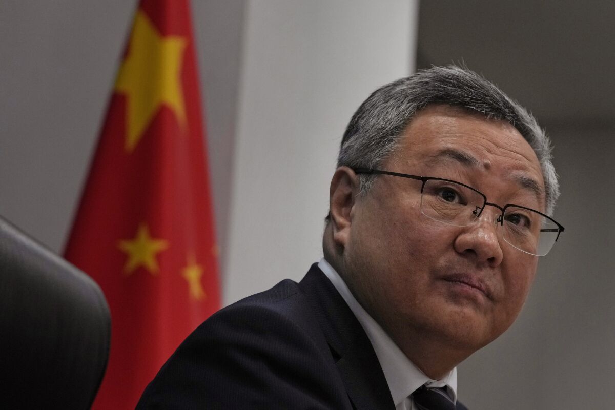 Fu Cong, the director general of the Foreign Ministry's arms control department, attends a press conference on nuclear arms control in Beijing, China, Tuesday, Jan. 4, 2022. The top Chinese arms control official denied Tuesday that his government is rapidly expanding its nuclear arsenal, though he said it is taking steps to ensure its nuclear deterrent remains viable in a changing security environment. (AP Photo/Ng Han Guan)