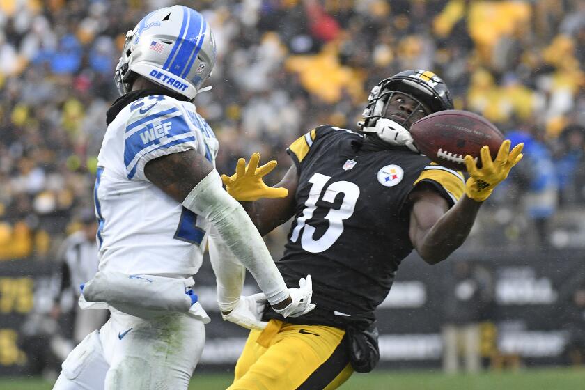 Pittsburgh Steelers wide receiver James Washington (13) can't handle a pass from quarterback.