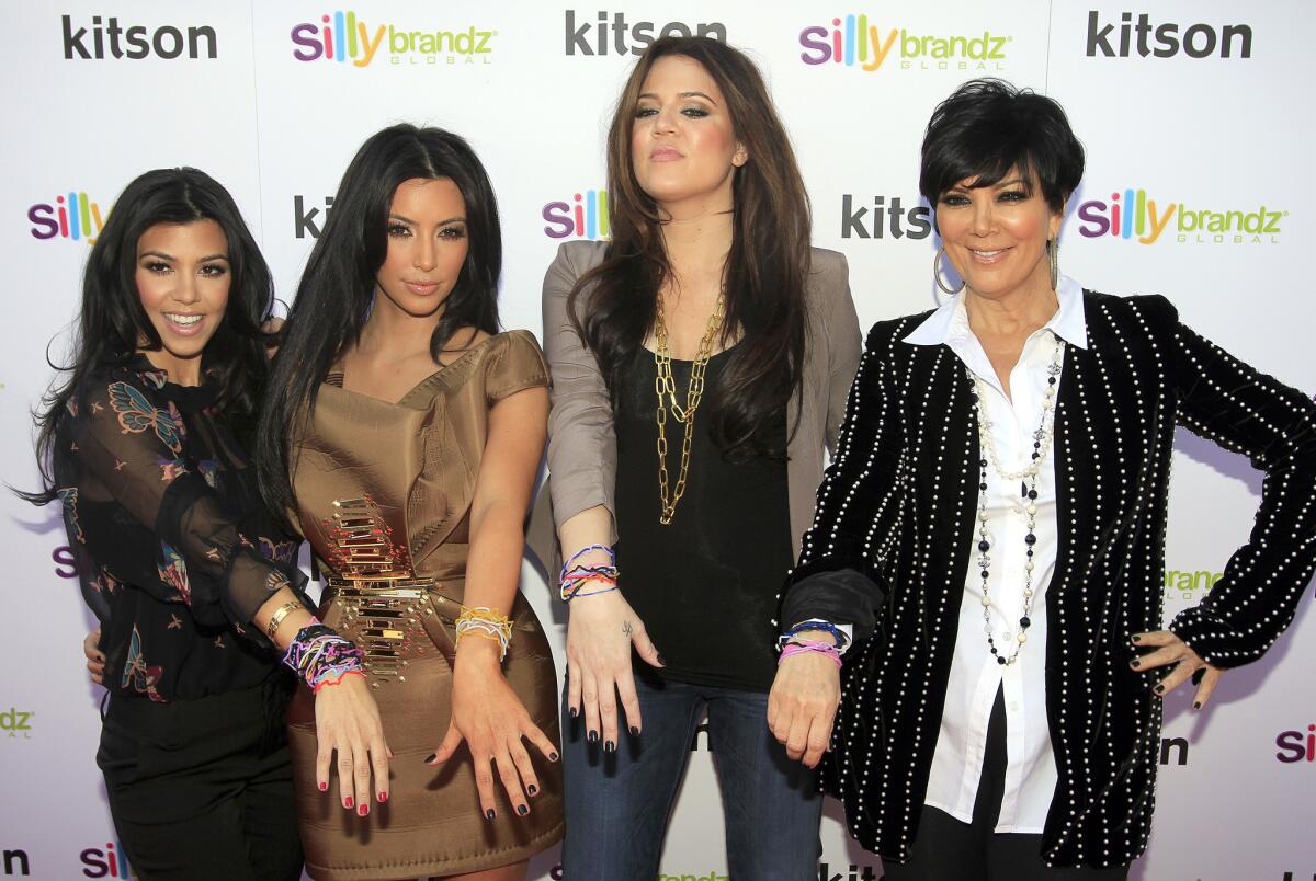 Kourtney, left, Kim and Khloe Kardashian and mother Kris Jenner -- the epitome of private-turned-public.
