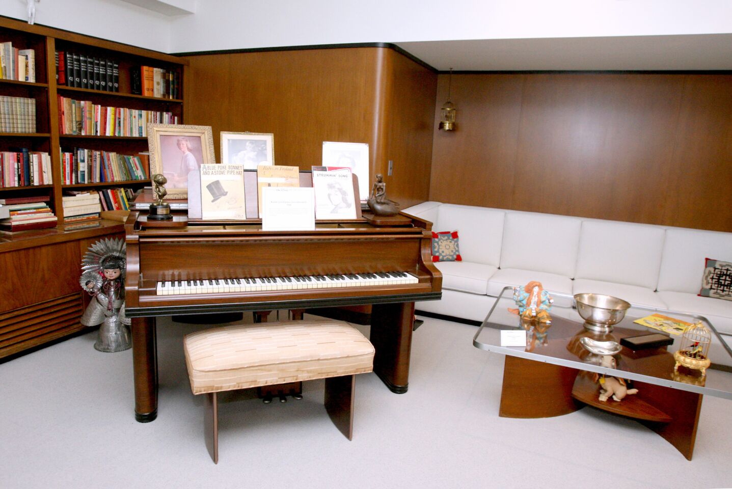To celebrate the 75th anniversary of the Walt Disney Studios in Burbank, the walt Disney Archives restored Walt Disney's original office suite, which was shown to members of the media on Tuesday, December 22, 2015. Above, the piano where composers used to play their songs for Walt Disney.The space is located in the original Animation building and was occupied by Walt Disney from 1940 to 1966, when he passed away at the age of 65 from lung cancer. The permanent exhibit will be opened to Disney employees, cast members and studio visitors and it will be added to tours of the studio lot that gold members of the official fan club, D23, can take.