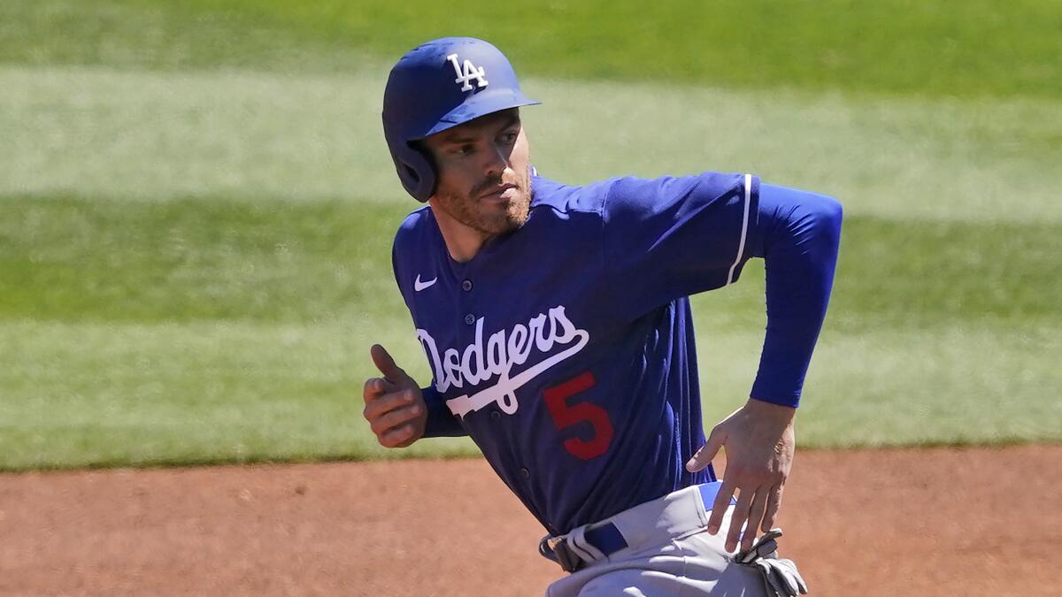 Dodgers first baseman Freddie Freeman runs the bases during a spring training game in March.