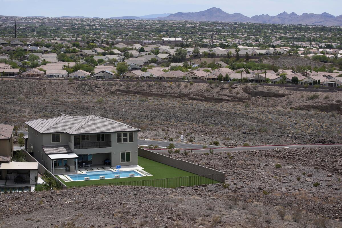 Home with a swimming pool on the edge of the Las Vegas valley