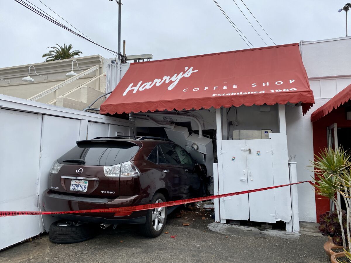 A man driving this vehicle mistook the gas pedal for the brake, causing it to crash into the rear of Harry's Coffee Shop.
