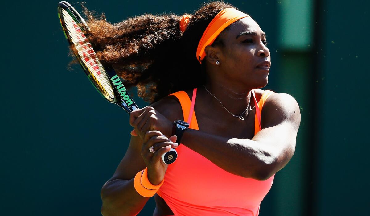 Serena Williams follows through on a shot against CiCi Bellis during their match at the Miami Open on Sunday.