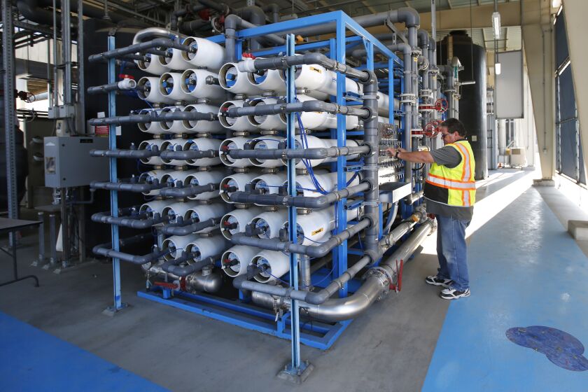 David Mills, Sr. Plant Tech Supervisor looks over reverse osmosis filters at the Pure Water Demonstration Facility in San Diego on Nov. 5, 2019.