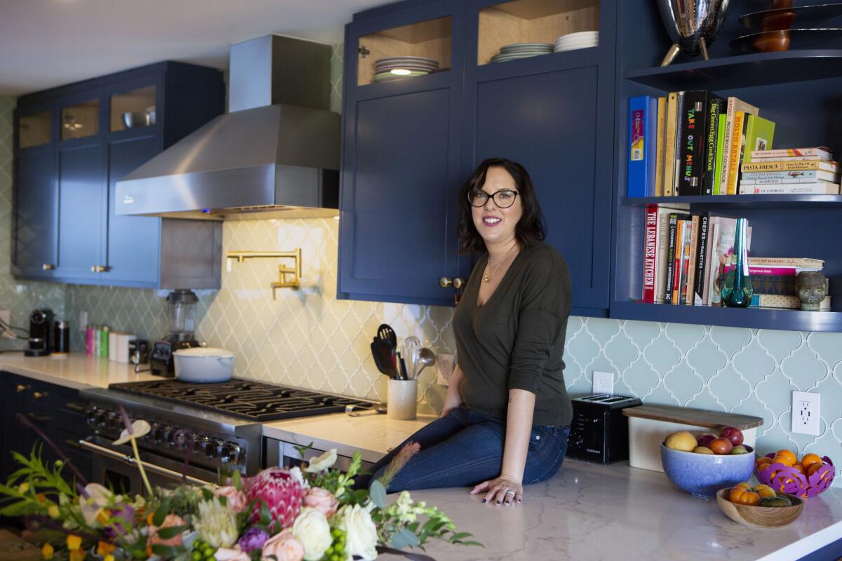Karina Miller, a producer and executive known for the movies “To the Bone" (2017), "Semper Fi" (2019) and "The Big Ask" (2013), likes to relax through cooking in her Studio City kitchen.