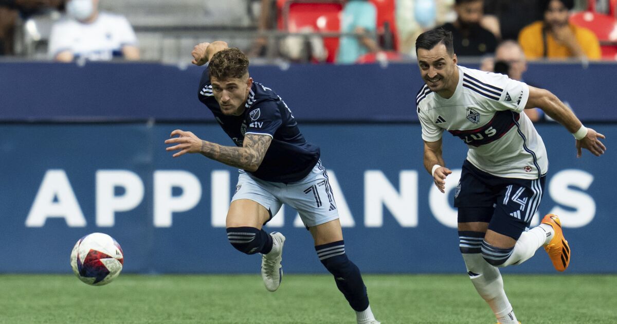 Gauld’s late PK goal helps Whitecaps tie Sporting KC 1-1