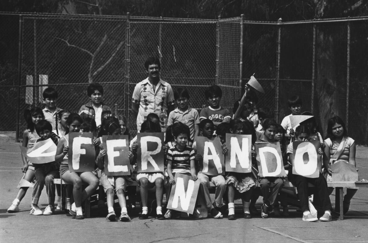 Los Angeles, CA. Kids at Aldama Elementary School in Highland Park spell out Dodgers Pitcher Fernando Valenzuela's name. 