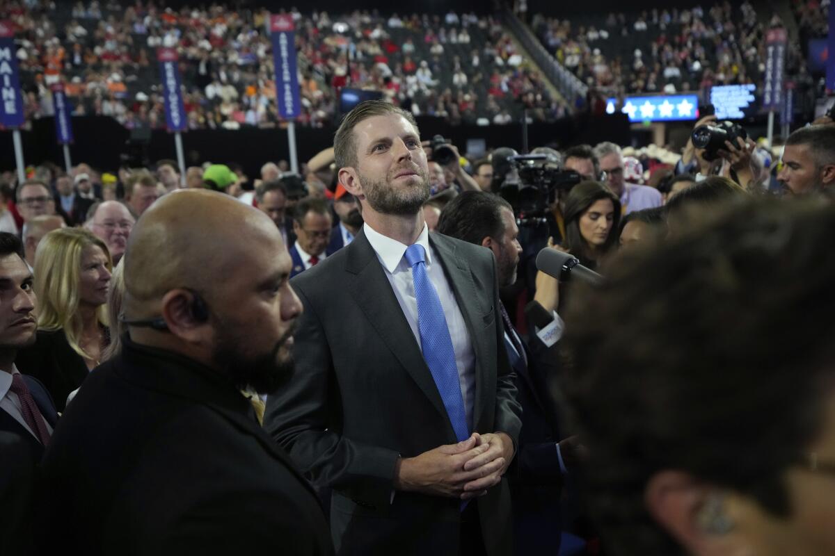 Eric Trump watches the roll call of states during the Republican National Convention on Monday night.