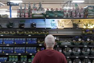 A customer browses the holiday lights section at Blackhawk Hardware, Wednesday, Nov. 1, 2023, in Charlotte, N.C. On Wednesday, the Commerce Department releases U.S. retail sales data for October. (AP Photo/Erik Verduzco)