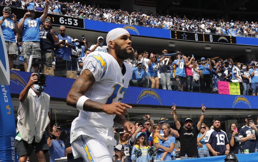  Fans cheer Chargers wide receiver Keenan Allen as he enters the SoFi Stadium field.