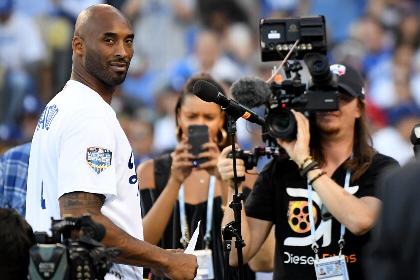 Kobe Bryant attends Game Four of the 2018 World Series between the Boston Red Sox and the Dodgers at Dodger Stadium