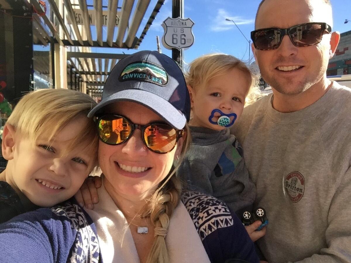 Ryan Huff, 40, of Lakewood died Saturday in Laguna Beach after suffering cardiac arrest at the remote Totuava Beach cove. He is pictured with his family in an undated photo.