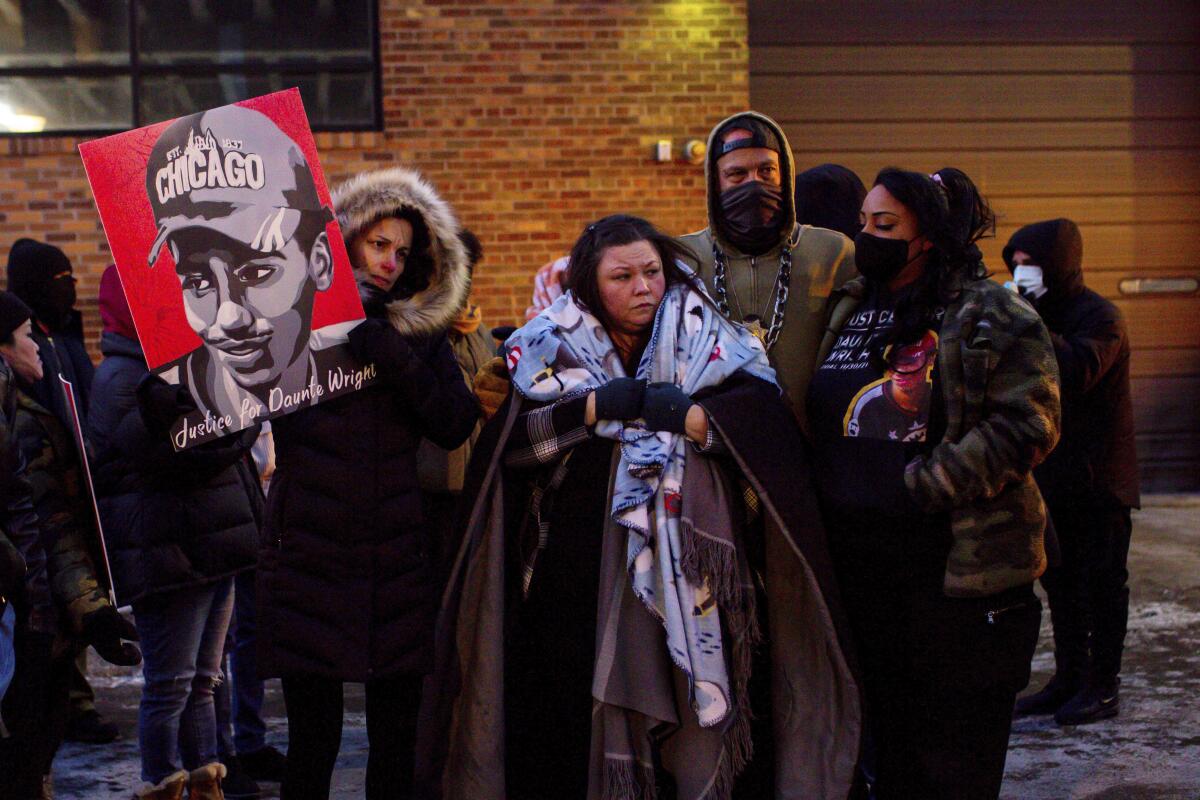 Daunte Wright's mother is surrounded by community members and activists.
