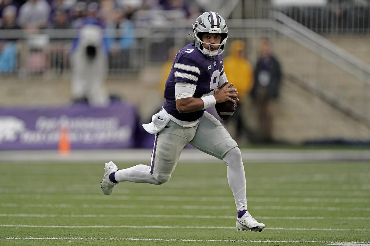 Kansas State quarterback Adrian Martinez looks to pass during the first half of an NCAA college football game against Missouri Saturday, Sept. 10, 2022, in Manhattan, Kan. (AP Photo/Charlie Riedel)