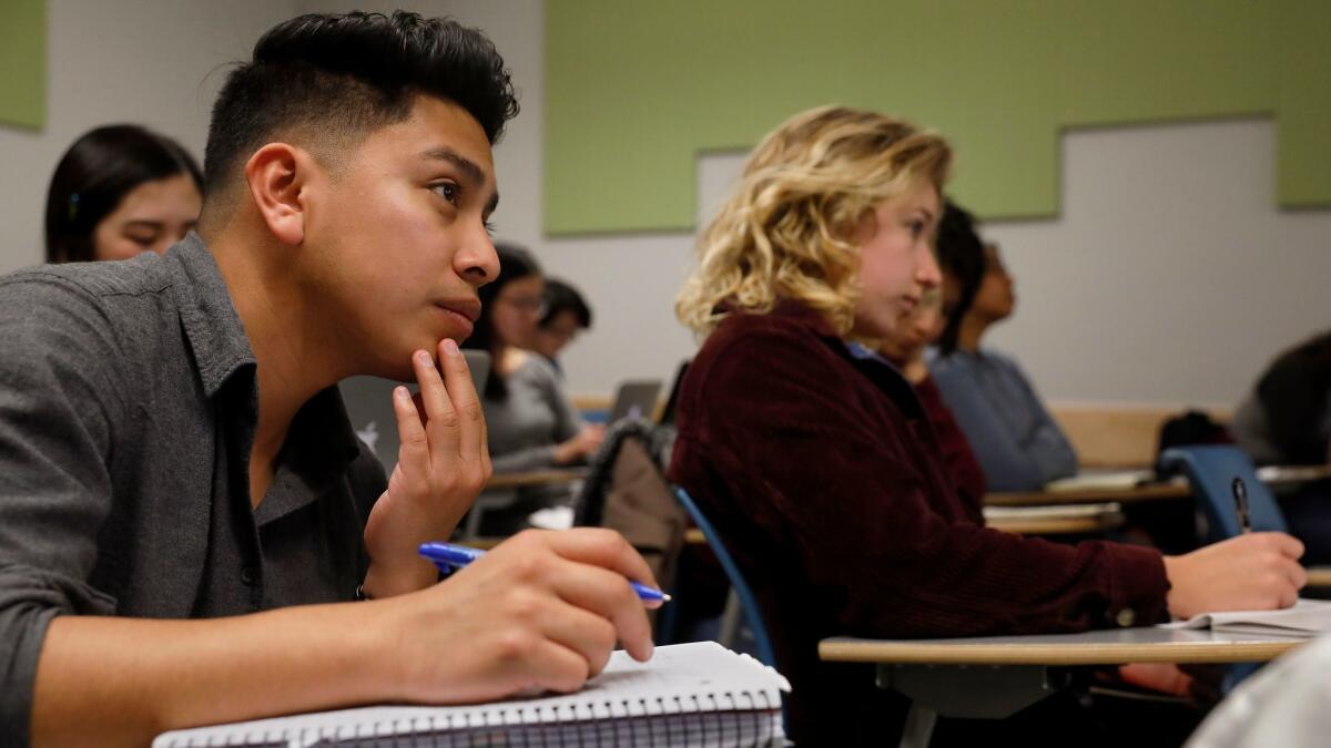 UC Berkeley student Ismael Chamu, 21, attends his urban sociology class on March 1.