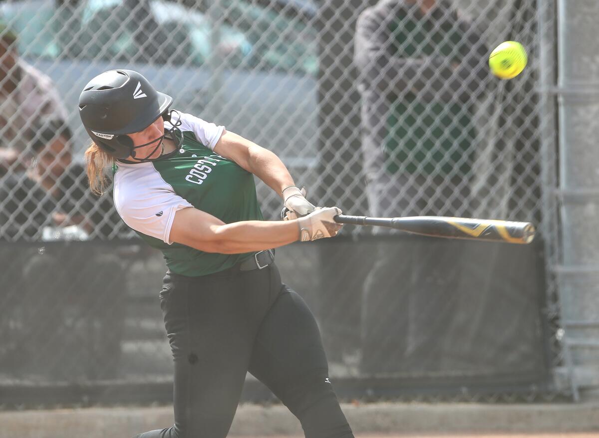 Costa Mesa's Sydnie Pulido hits a single in the first round of the CIF Southern Section Division 6 softball playoffs.