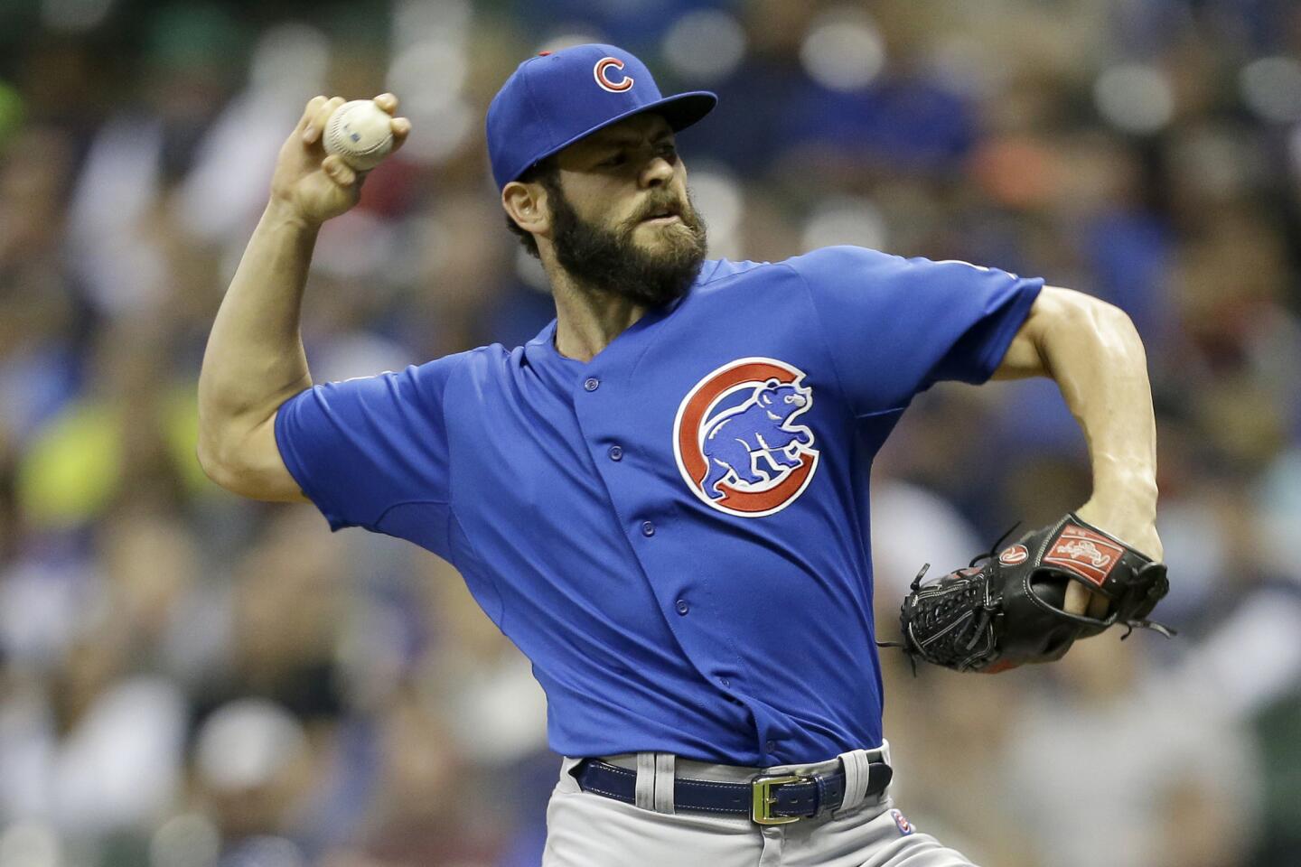 Jake Arrieta pitches during the first inning against the Milwaukee Brewers at Miller Park.