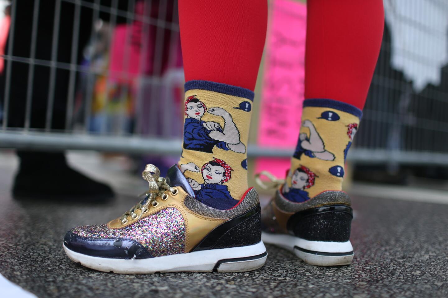 Corielle Laaspere wears socks decorated with images of World War II-era cultural icon Rosie the Riveter at the Women's March on Chicago on Jan. 21, 2017.