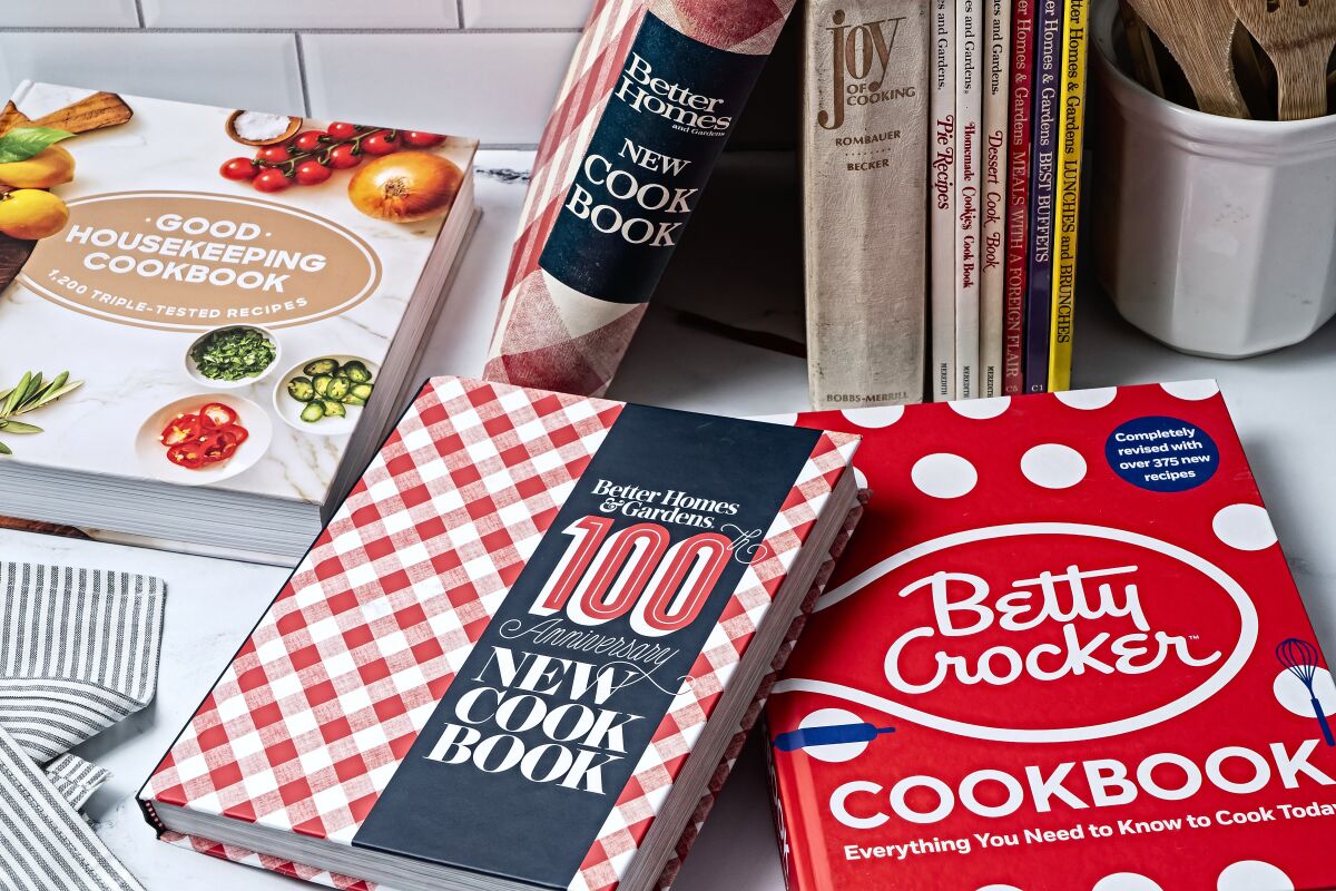 A group of cookbooks from brands like Betty Crocker and Better Homes and Gardens.