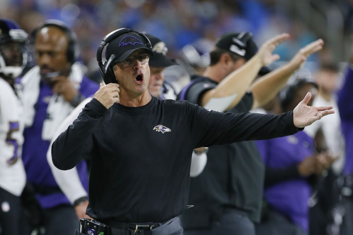 Baltimore Ravens head coach John Harbaugh watches against the Detroit Lions in the second half of an NFL football game in Detroit, Sunday, Sept. 26, 2021. (AP Photo/Duane Burleson)