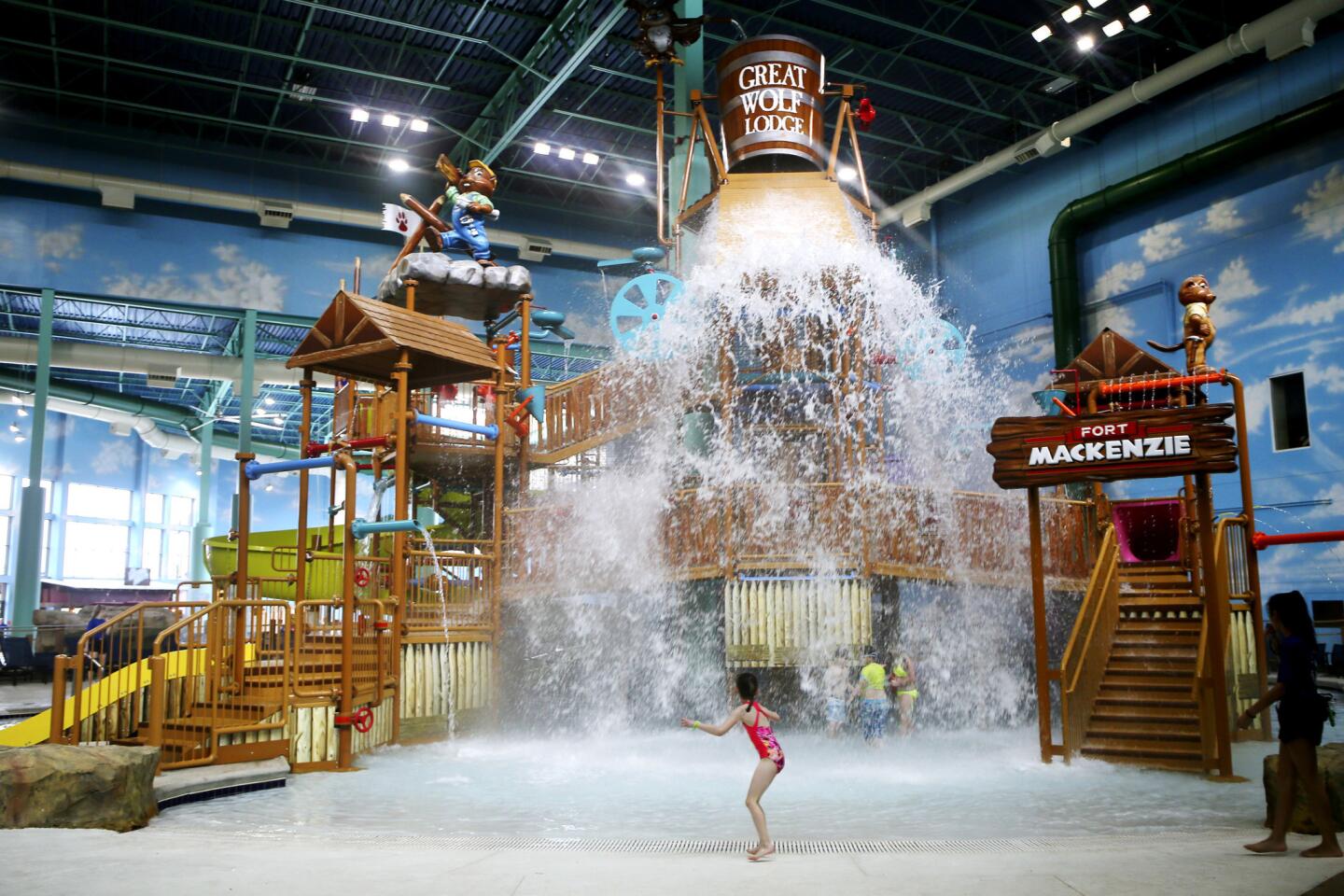 Water pours down a three-story play structure inside of Wiley's Water Park at the new Great Wolf Lodge on June 19, 2018, in Gurnee.