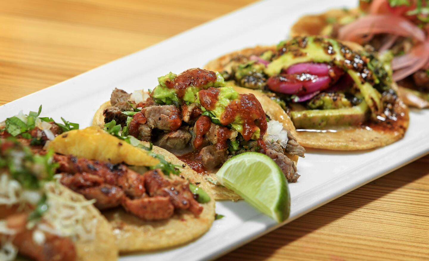 Tacos are generally $4 each or even less if you order a plate of three or more.