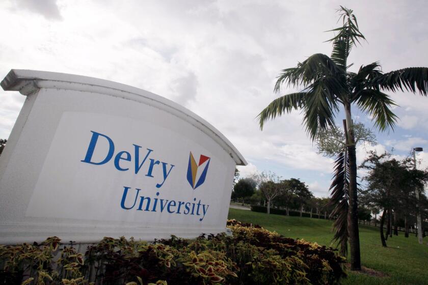 FILE - This Nov. 24, 2009, file photo, shows the entrance to the DeVry University in Miramar, Fla. DeVry Education Group, which owns DeVry University, announced Wednesday, May 24, 2017, that it will now be called Adtalem Global Education. (AP Photo/J Pat Carter, File)