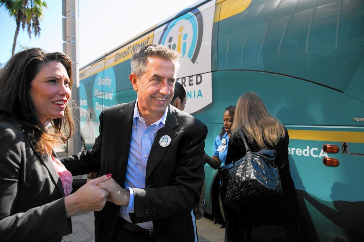 Covered California Executive Director Peter Lee greets a supporter at the start of open enrollment in November 2015.