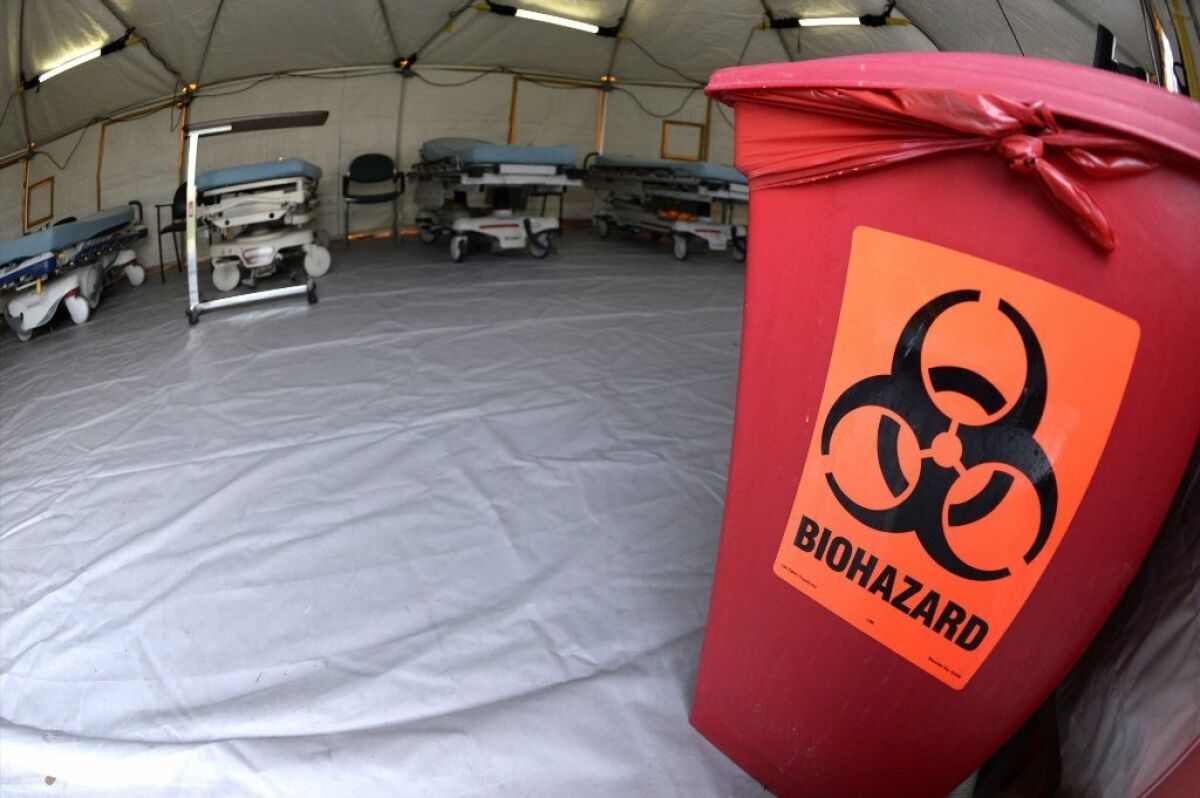 A "flu tent" is set up by a hospital in San Jose for the treatment of patients with flu-like symptoms.