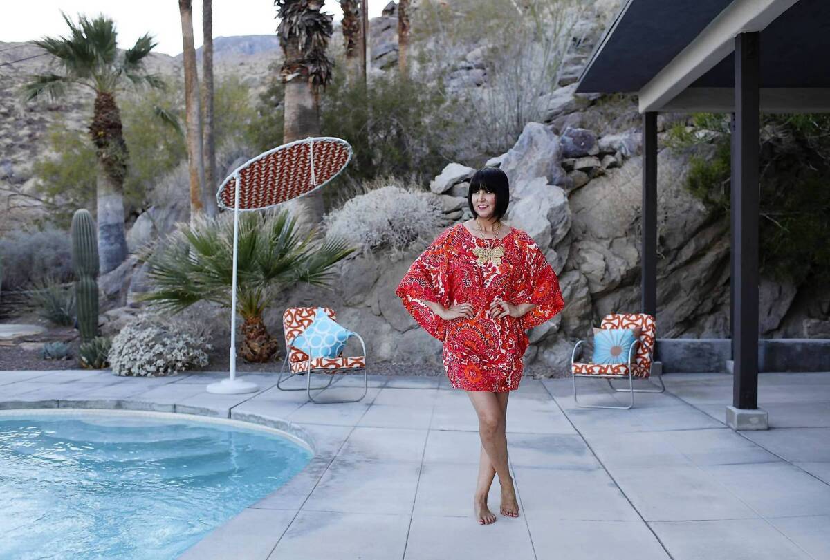 Trina Turk, wearing one of her own designs, is pictured at her home in Palm Springs. The desert city inspired her new summer line for Banana Republic.