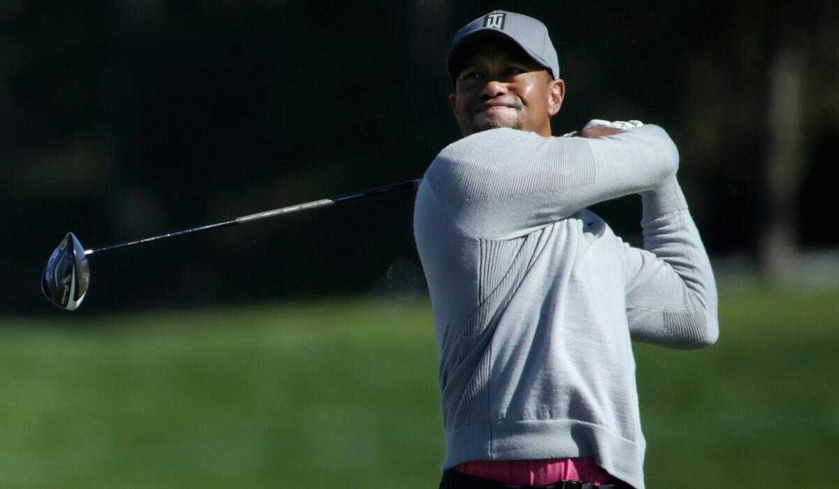 Tiger Woods plays his shot from the 14th tee during the Farmers Insurance Open at Torrey Pines on Jan. 27.