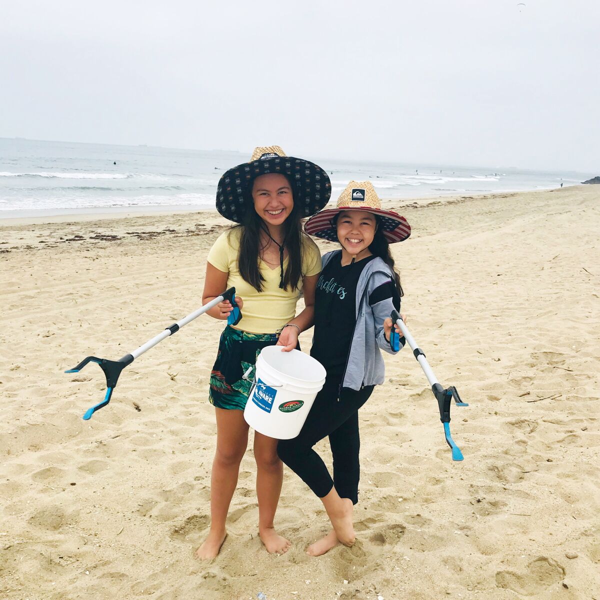 Chloe Mei Espinosa, left, runs a YouTube channel with her younger sister, Ella Lin, right, called "Sustainable Sisters."