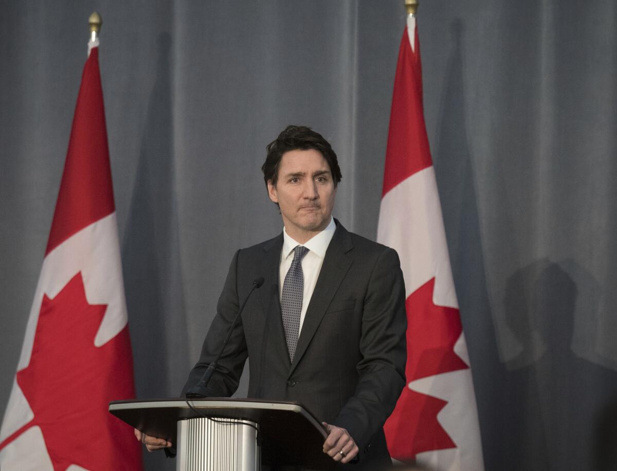 Canadian Prime Minster Justin Trudeau at a lectern